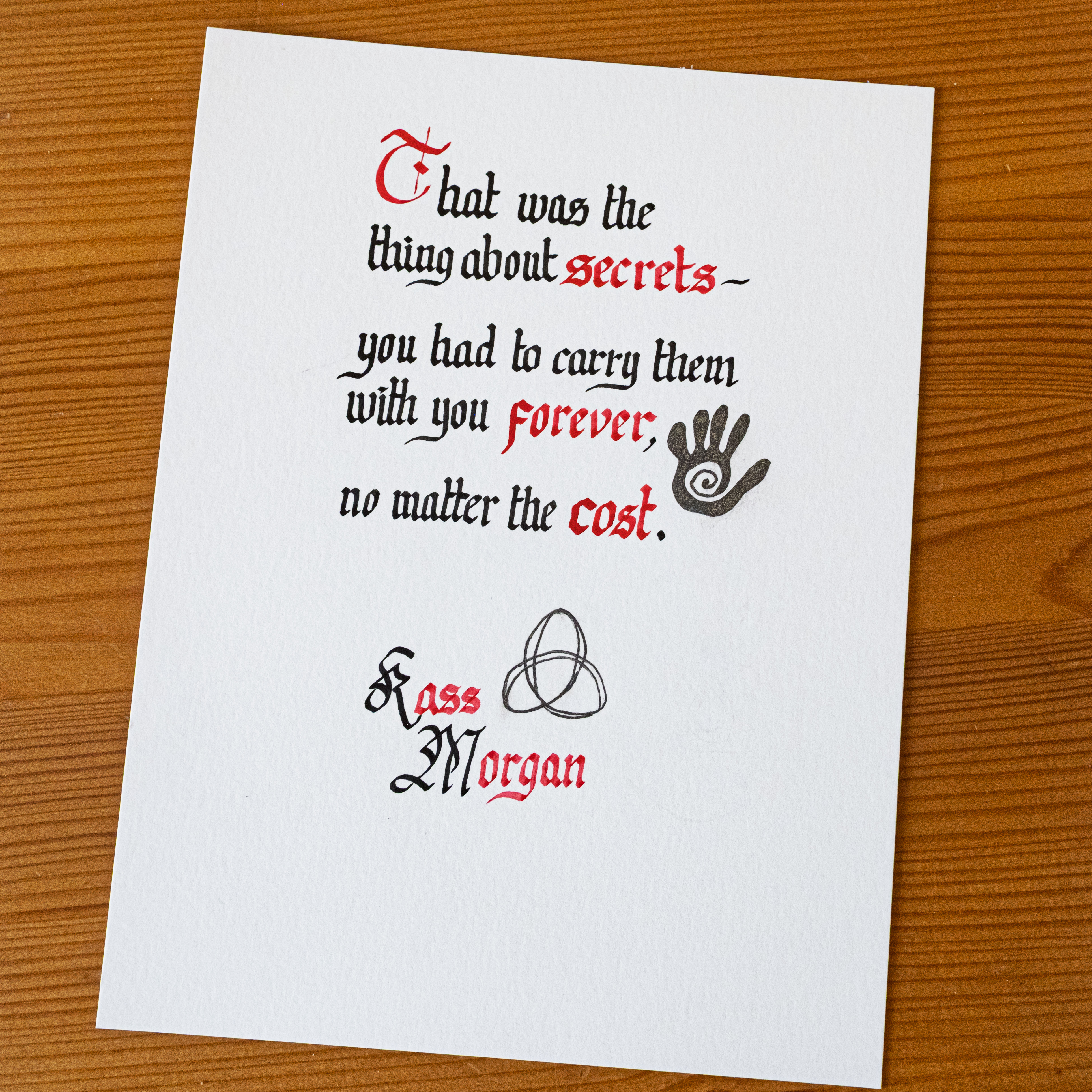 Kass Morgan quote in blackletter with red emphasis and author attribution